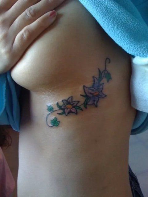 Sara - Ivy and flowers: real inked placement tattoo photo thumbnail