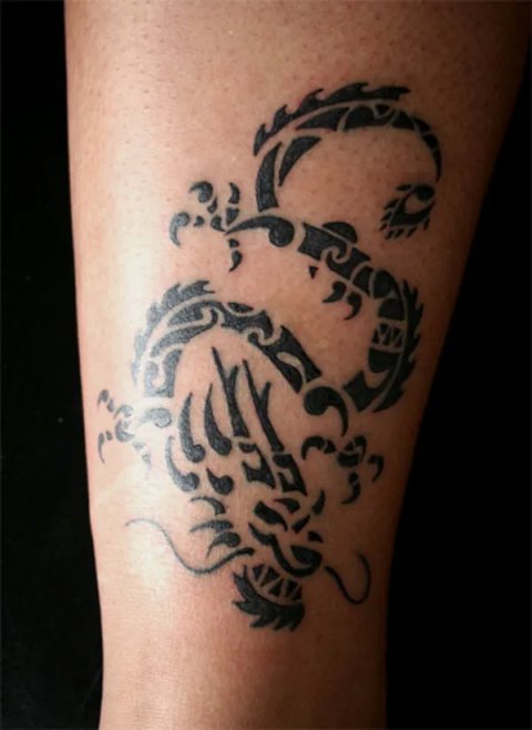 Shivani - Polynesian dragon: real inked placement tattoo photo thumbnail