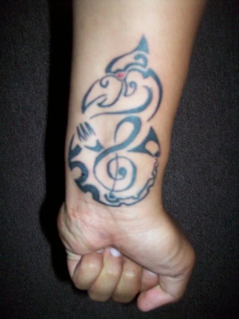 Souls - Manaia and treble clef: real inked placement tattoo photo thumbnail