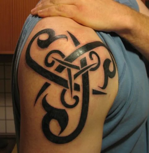 Steingrimur - Tribal triskell: real inked placement tattoo photo thumbnail