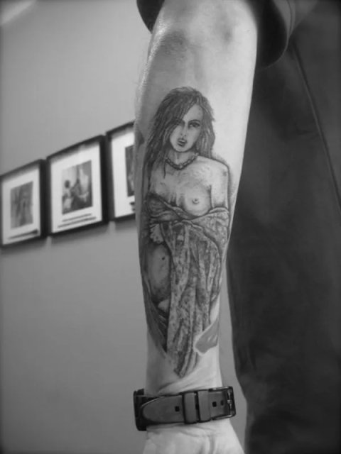 Tanne - sexy woman: real inked placement tattoo photo thumbnail