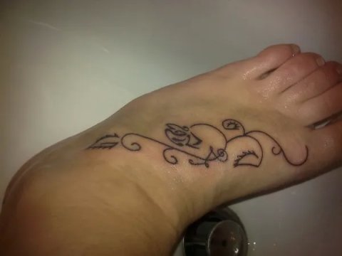Valentina - Thornless rose: real inked placement tattoo photo thumbnail