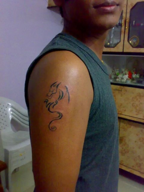 ZivenTattoos - Stylized dragon: real inked placement tattoo photo thumbnail