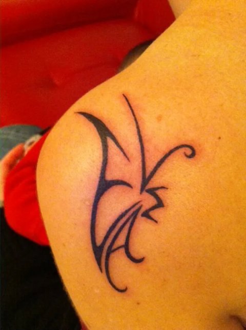 Amira - M+E+L+A butterfly: real inked placement tattoo photo thumbnail
