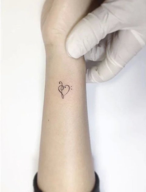 Guest - music heart: real inked placement tattoo photo thumbnail