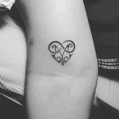 Khush - M infinity heart: inked placement tattoo photo thumbnail