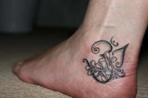 Monika - Om frangipani: real inked placement tattoo photo thumbnail